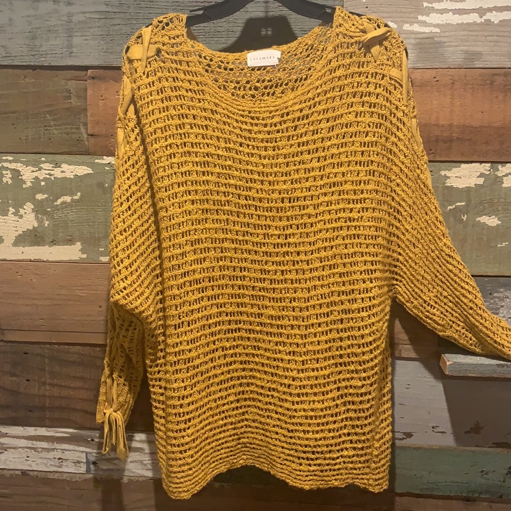 Open-weave sweater by “Dreamers”